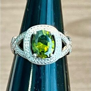 Elegant Silver Ring with Green Gemstone